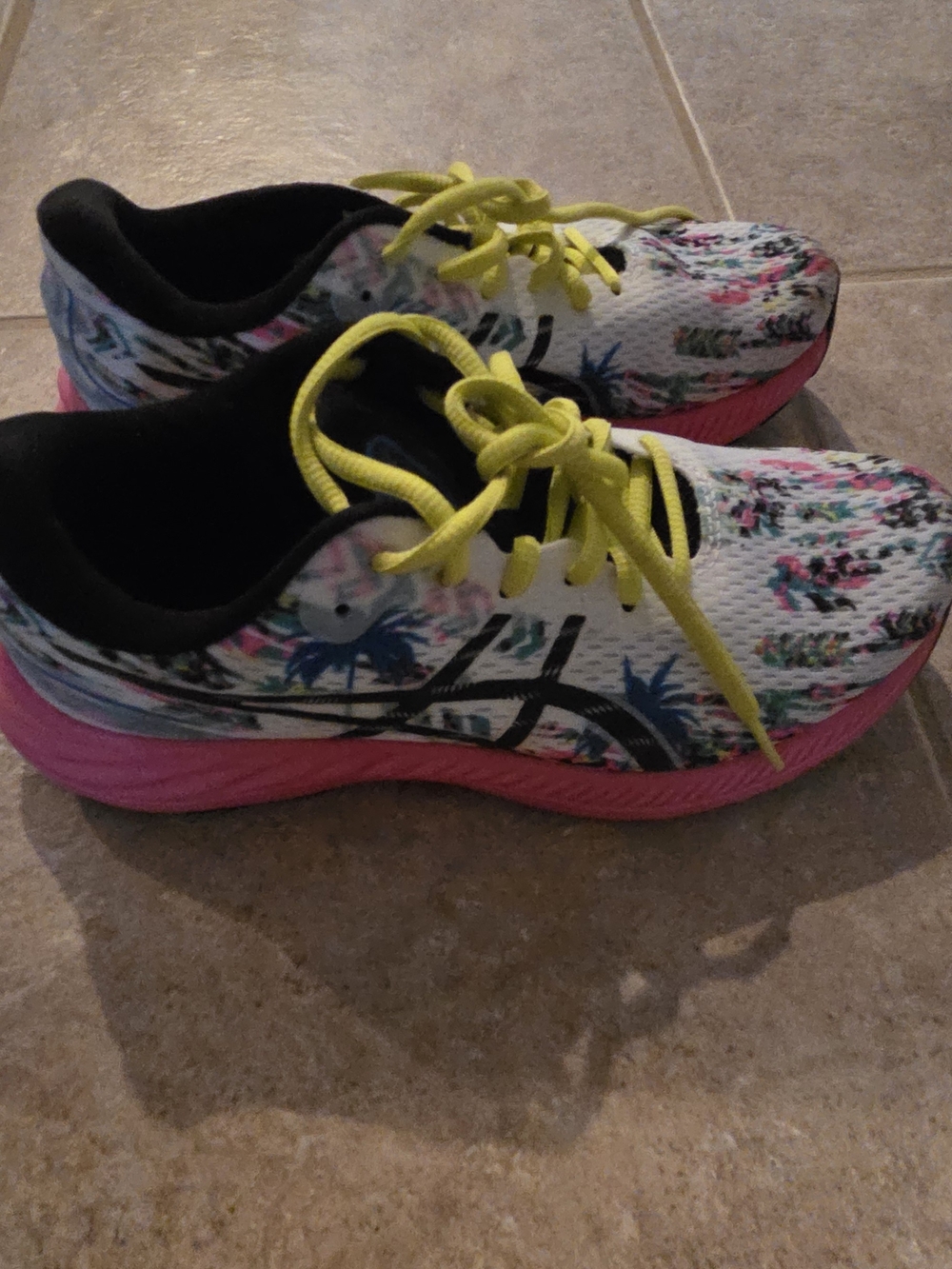 Asics Running Shoes with Pink Sole and Yellow Laces.